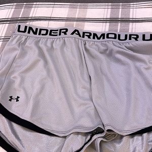 Grey under armour shorts. Size large
